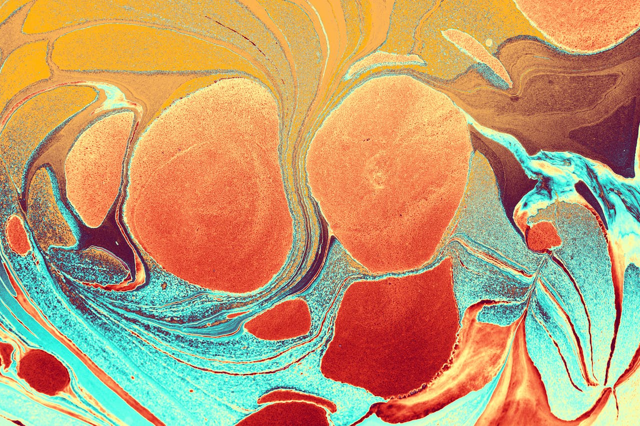 Dynamic and colorful abstract pattern with swirling textures and vibrant colors.
